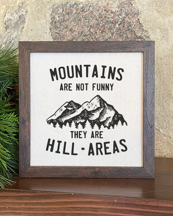 Mountains are not Funny - Framed Sign